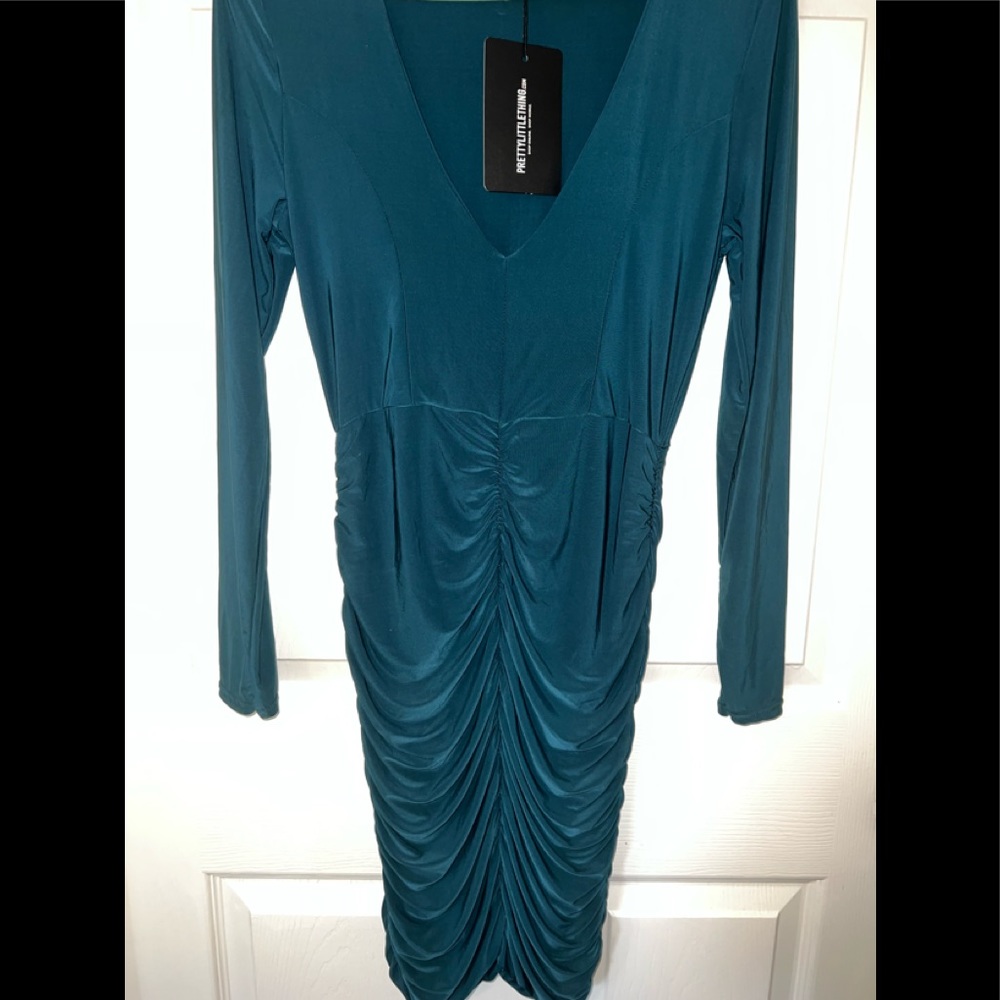 Women’s new emerald green size 6 longsleeve